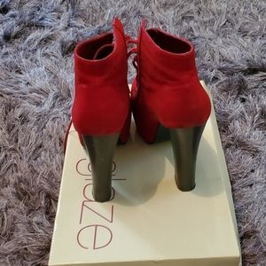 Red platform booties in size 6